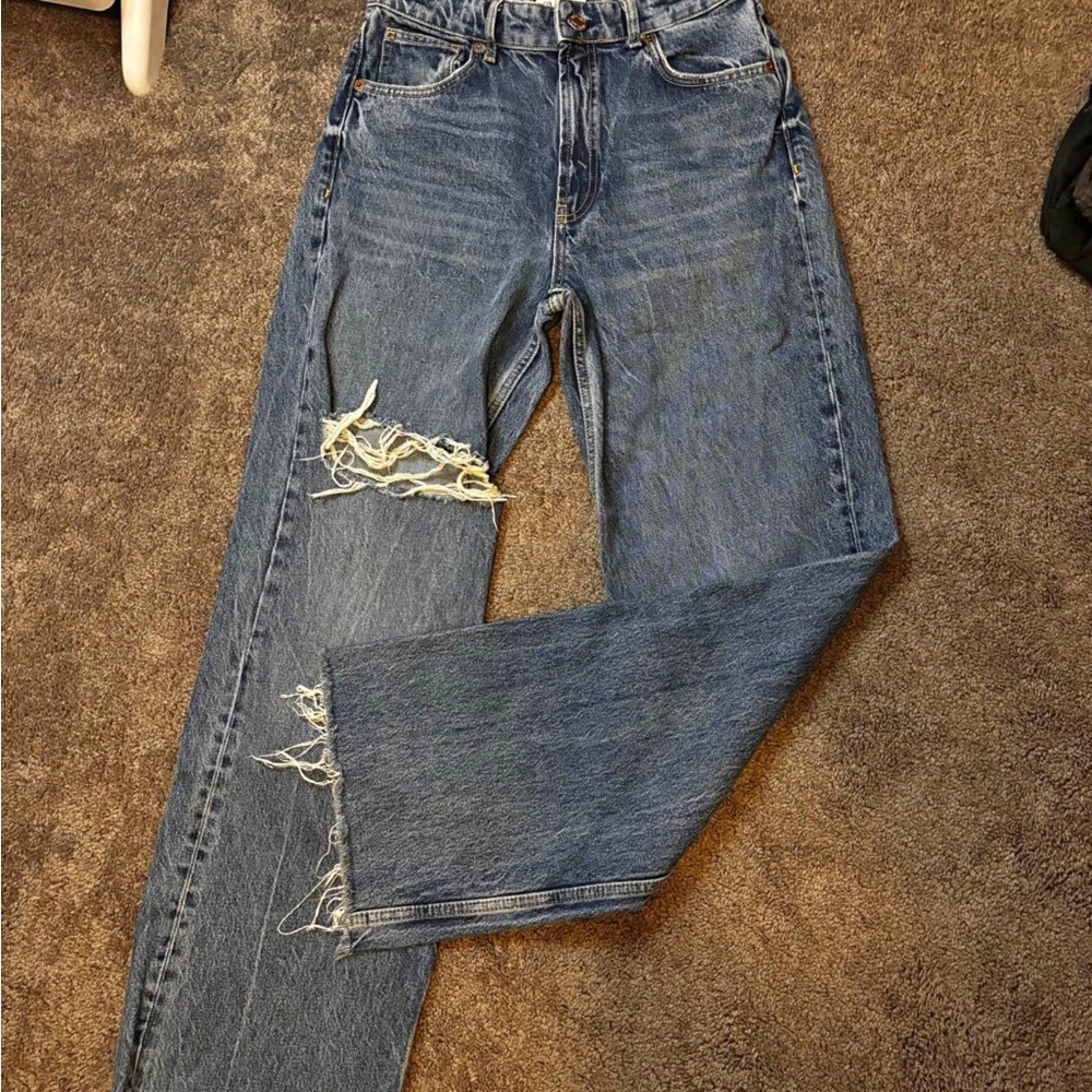 Women's Distressed Blue Jeans